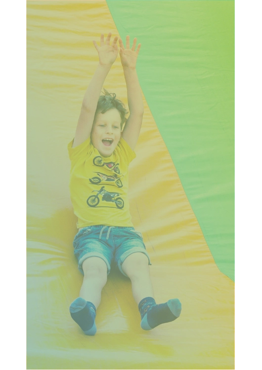 Happy kid sliding down.