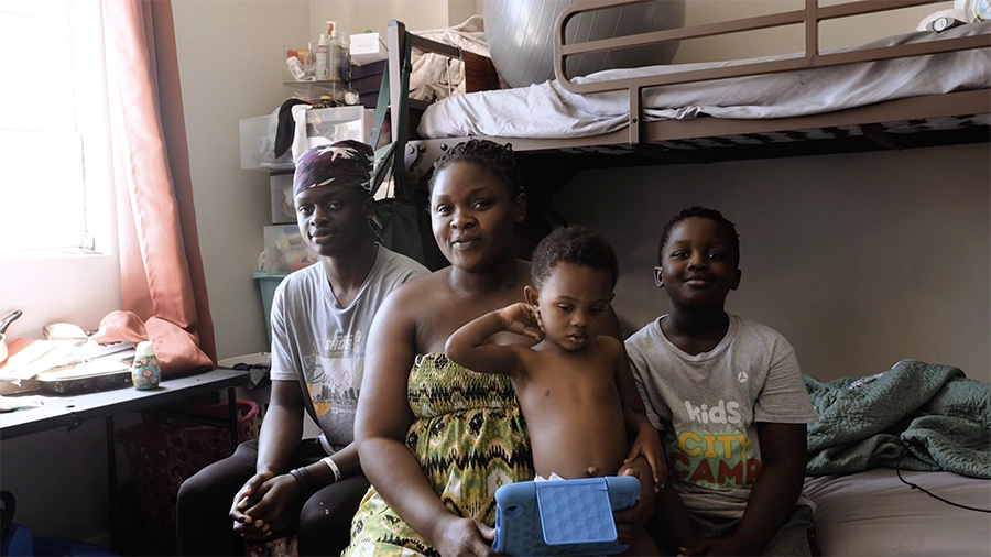 Elderly homeless person sitting on the street wrapped in blankets, illustrating the need for local church compassion initiatives through CityServe to help the hurting.