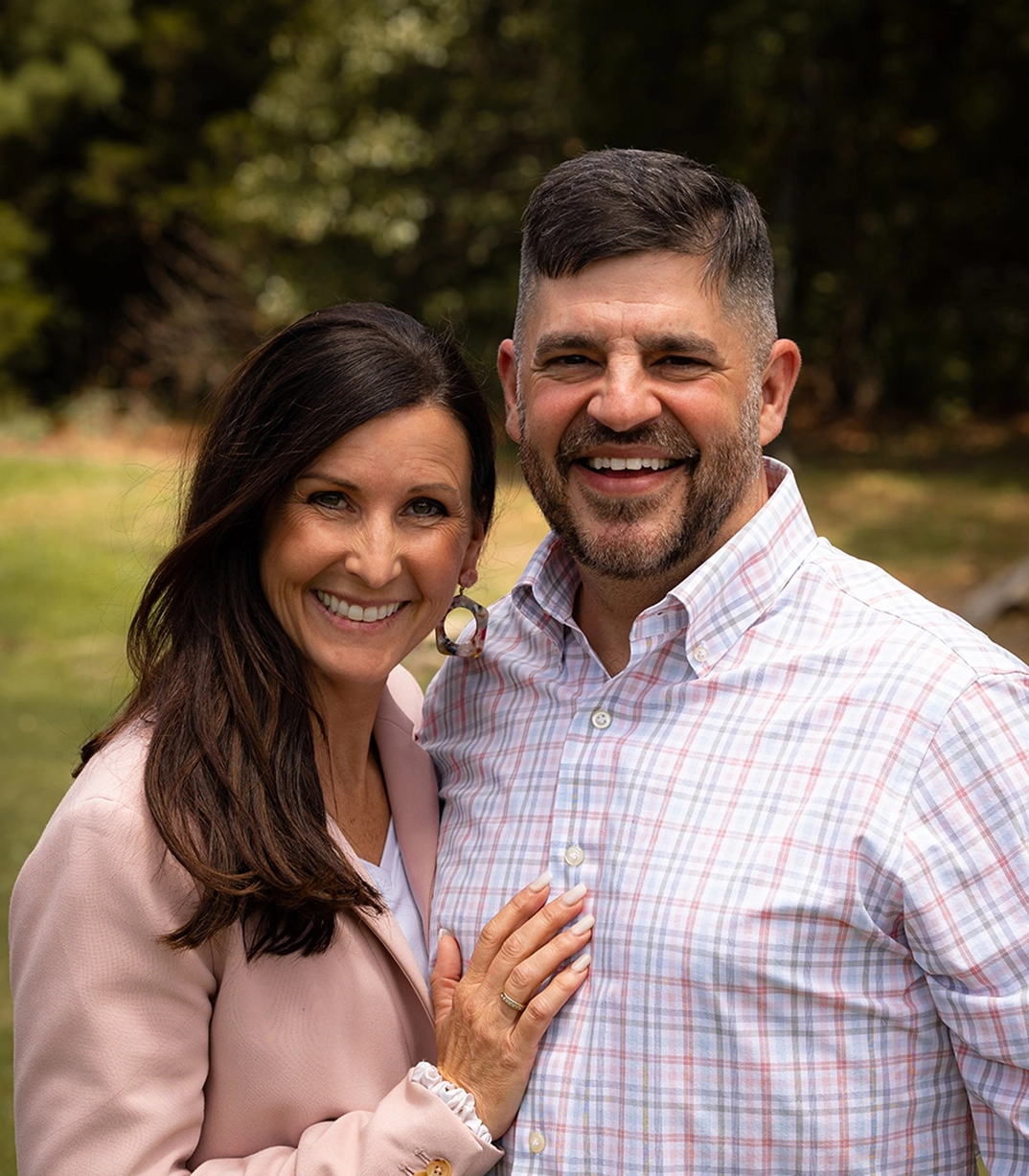 Darren and Marci DeLaune smiling outdoors, CityServe Board Member and New Life Church leadership.